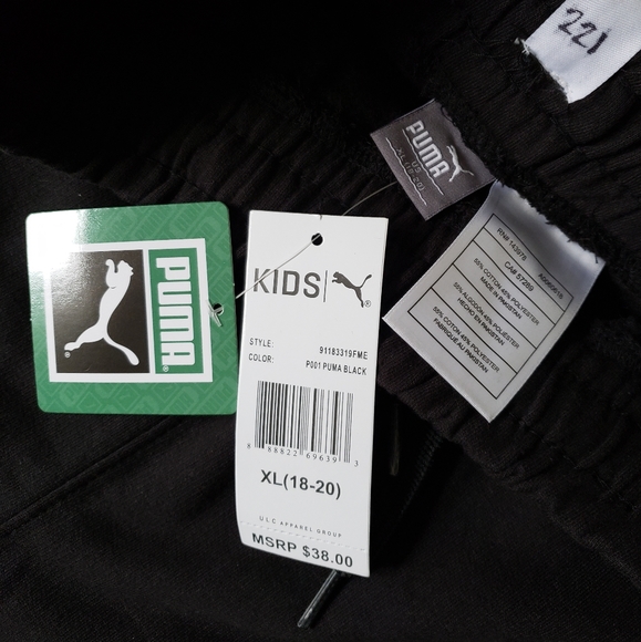 Brand new Puma sweatpants for kid's or women. Black with yellow and gray stripes - Picture 5 of 5